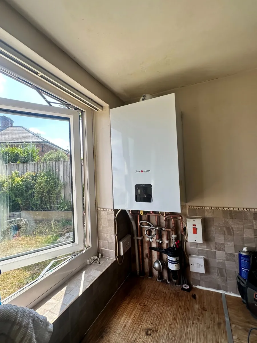 Betaflo boiler installation with condensate pipework and magnetic system filter