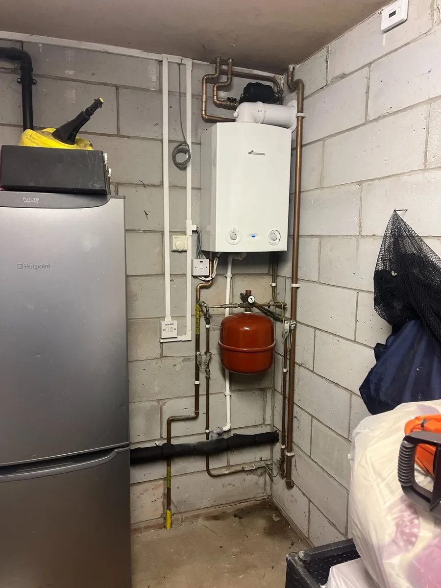 Betaflo combi boiler installation with pressure gauge and copper pipework