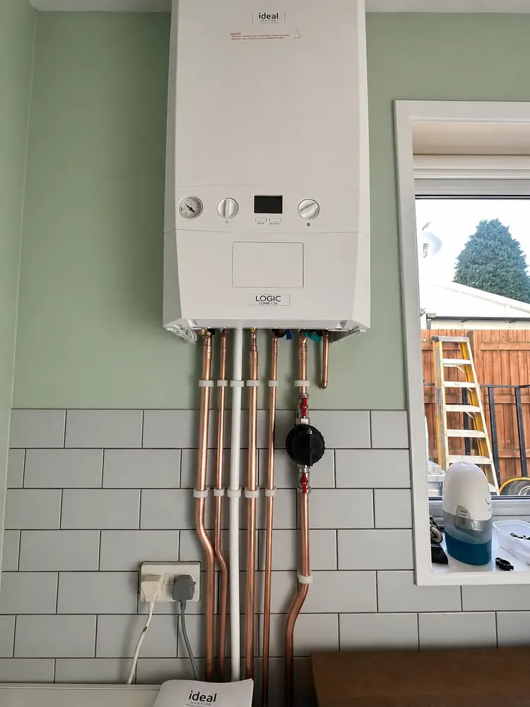 New Betaflo boiler installation with neat copper pipework and system filter