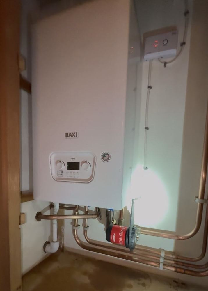 Betaflo heating system installation with modern controls and insulated pipework